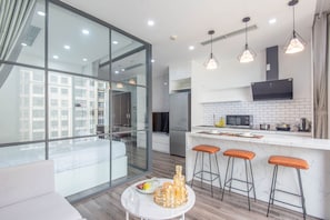 Superior Apartment | Private kitchen | Full-sized fridge, microwave, rice cooker, cookware/dishes/utensils - NVT Housing - Vinhomes D'Capitale Apartment Hanoi (Hanoi)
