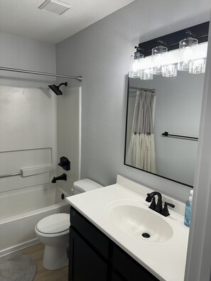 Hair dryer, towels, soap, shampoo