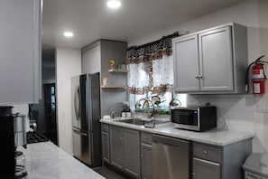 Fridge, microwave, oven, stovetop - Spacious Home w/ Backyard Basketball + Laundry (Lancaster)