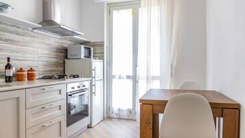 Fridge, microwave, coffee/tea maker, electric kettle