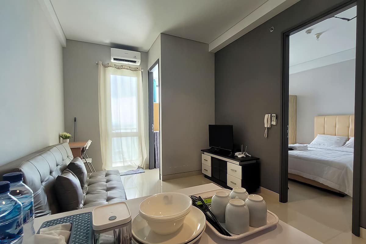 Business-Apartment, 2 Schlafzimmer, Meerblick | Wohnbereich | 25-Zoll-Smart-TV mit Digitalempfang