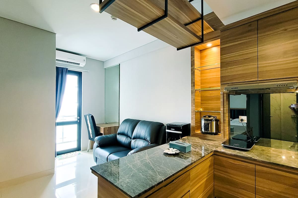 Signature Apartment, 2 Bedrooms, Sea View | Living area | 31-inch flat-screen TV with digital channels