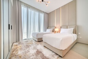 2 quartos, cofres nos quartos, ferros/tábuas de passar roupa