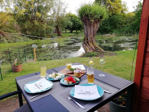 Ferienwohnung 'Am Froschteich' mit Privatterrasse, Gemeinschaftsgarten und WLAN