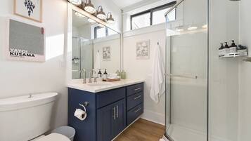 Eco-friendly toiletries, hair dryer, towels