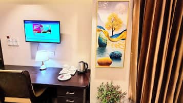 Suíte premium, 1 cama King | 1 quarto, cofres nos quartos, escrivaninha, quartos à prova de som