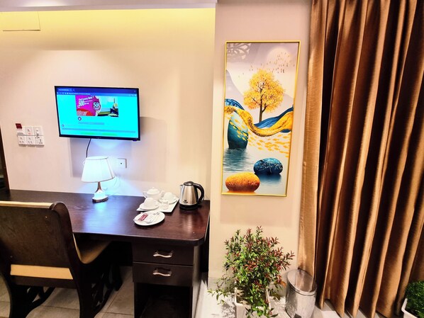 Suíte premium, 1 cama King | 1 quarto, cofres nos quartos, escrivaninha, quartos à prova de som