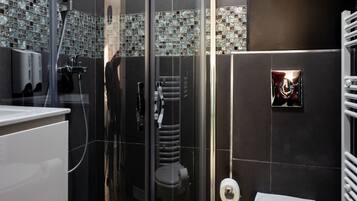 Standard Studio | Bathroom | Shower, hair dryer, towels, soap