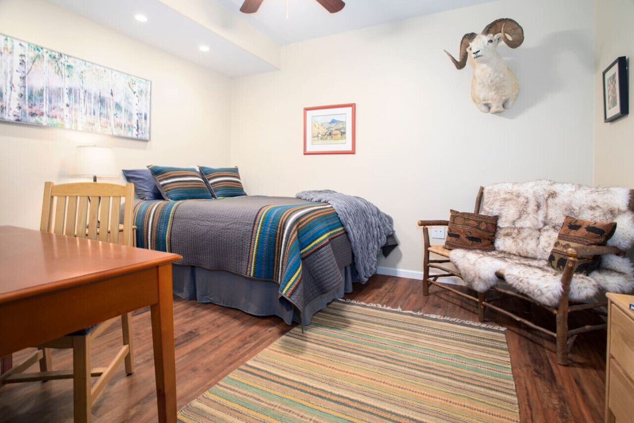 1 bedroom, desk, iron/ironing board, travel cot