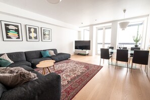 Deluxe Apartment | Living area | 50-cm Smart TV with cable channels - 2ndhomes Gorgeous & Modern 2BR Apartment (Helsinki)