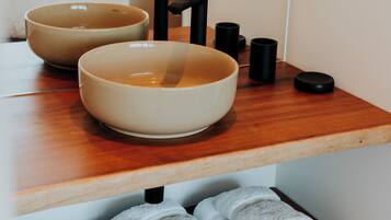 Shower, eco-friendly toiletries, towels, soap