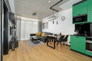 Apartment, 1 Bedroom, Balcony | Living area - Black and Green Apartment by Renters (Poznan)