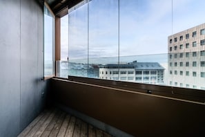 Enjoy a city view from the comfort of your room, with a large window offering a glimpse of the urban landscape.