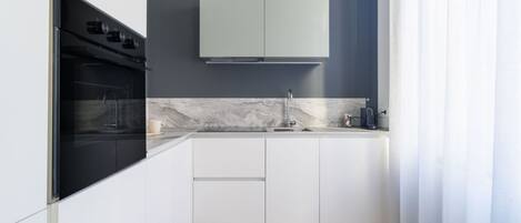 Réfrigérateur, four, plaque de cuisson, lave-vaisselle