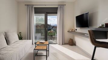 Standard Apartment | Living area | Flat-screen TV