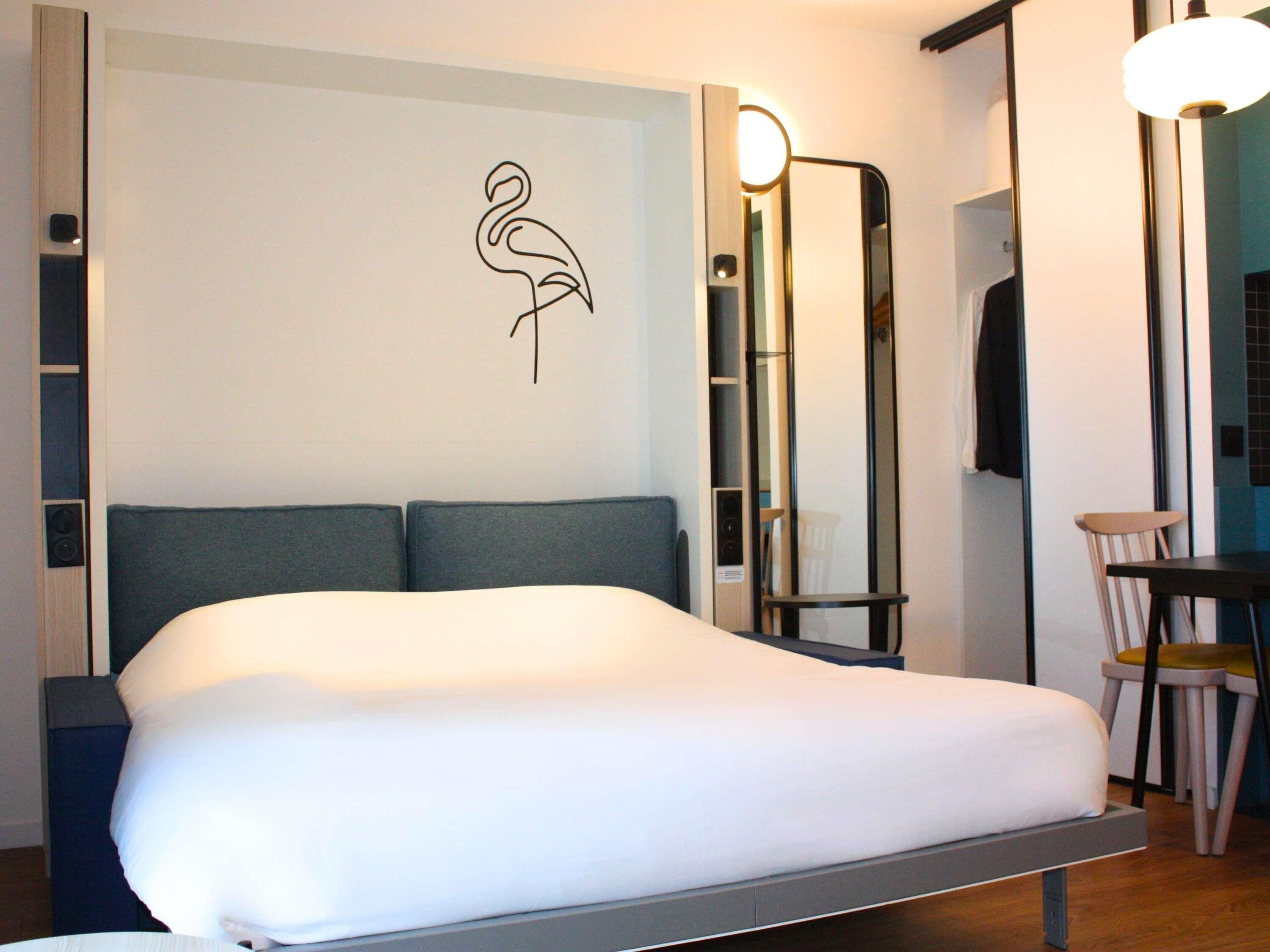 Premium bedding, blackout curtains, soundproofing, iron/ironing board