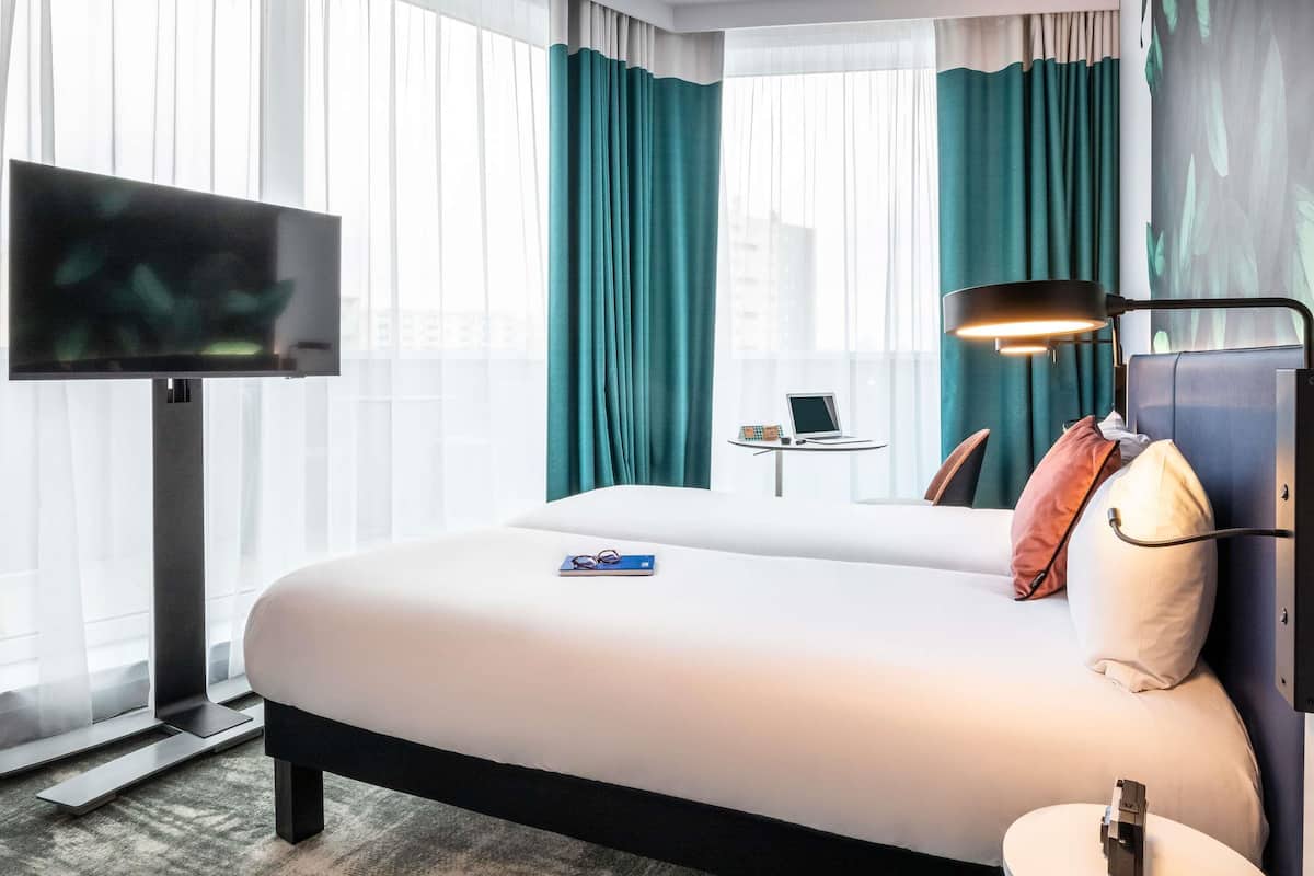 Ropa de cama de alta calidad y cortinas blackout