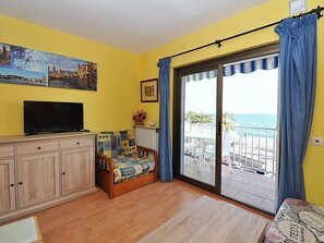 TV - Seaview Apartment with Terrace, Central Lloret de Mar, Beachfront, 1BR, WIFI, Sleeps 4 (Lloret de Mar)