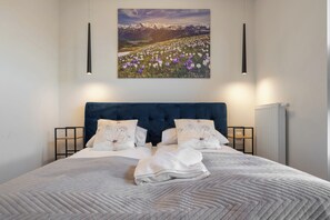 Departamento superior | Tabla de planchar con plancha, wifi gratis y ropa de cama 