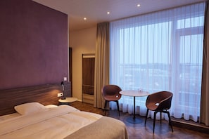 Deluxe Double Room | In-room safe, desk, laptop workspace, blackout drapes