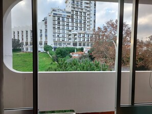 Guests can enjoy views of the surrounding cityscape from the comfort of their room.