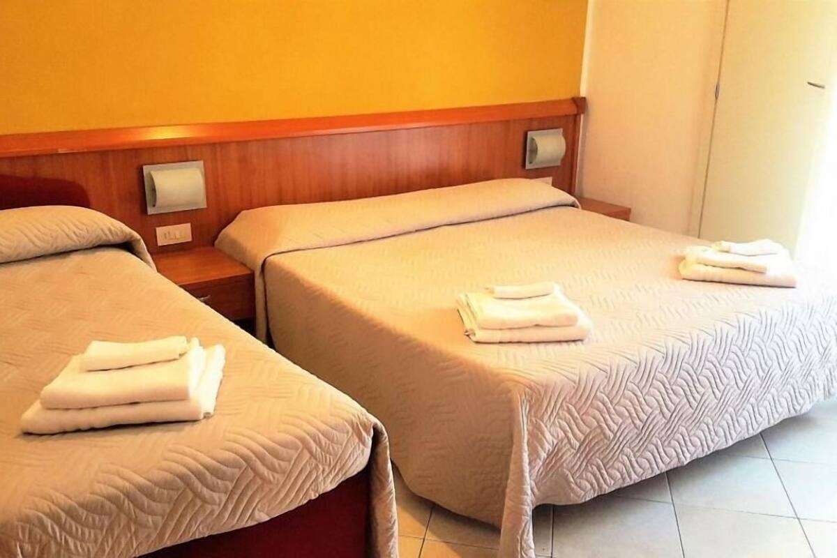 Basic Triple Room | Egyptian cotton sheets, premium bedding, down comforters, in-room safe