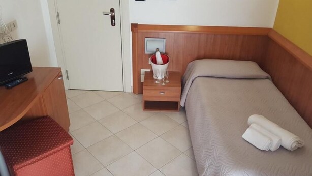 Habitación individual clásica | Sábanas de algodón egipcio y ropa de cama de alta calidad