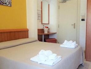 Egyptian cotton sheets, premium bedding, down comforters, in-room safe