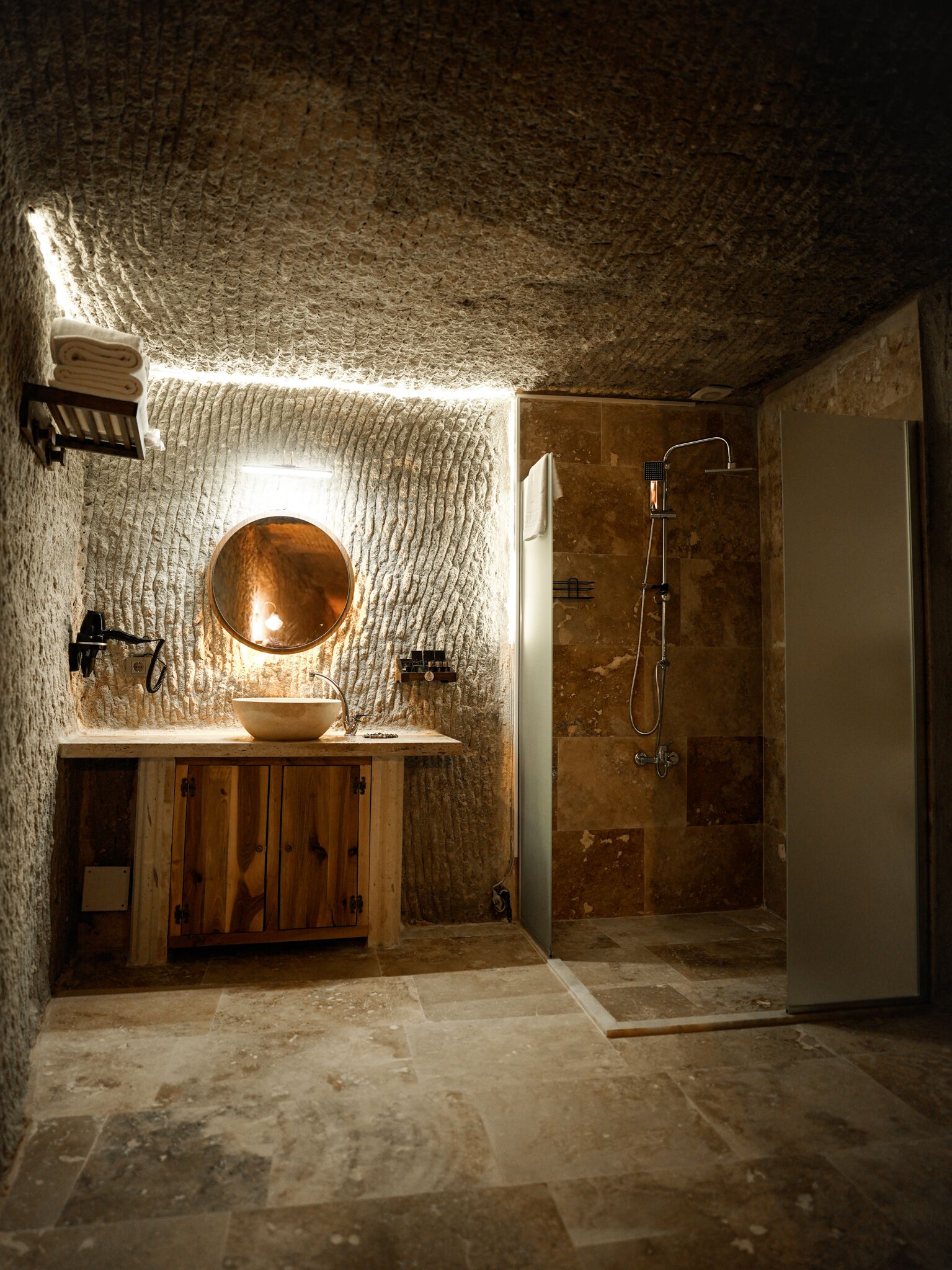 Grand Studio Suite, Multiple Beds | Bathroom | Hair dryer, slippers, towels, soap