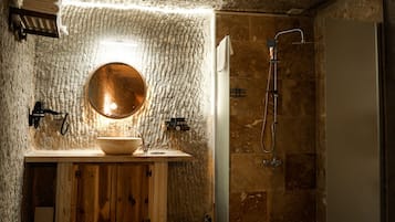 Grand Studio Suite, Multiple Beds | Bathroom | Hair dryer, slippers, towels, soap