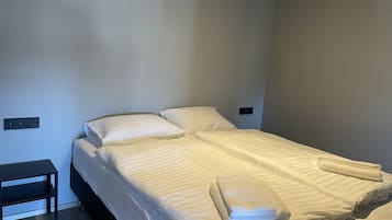 Apartamento superior | Quartos à prova de som, Wi-Fi de cortesia, roupa de cama