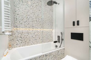 Shower, hair dryer, shampoo