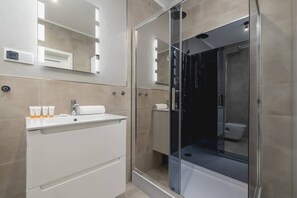 Shower, hair dryer, soap, shampoo