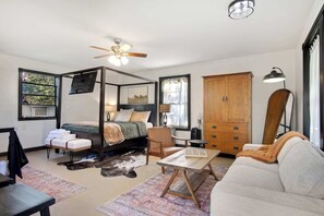 1 bedroom, desk, iron/ironing board, travel crib