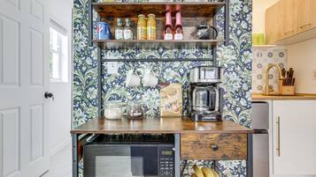 Microwave, coffee/tea maker, paper towels