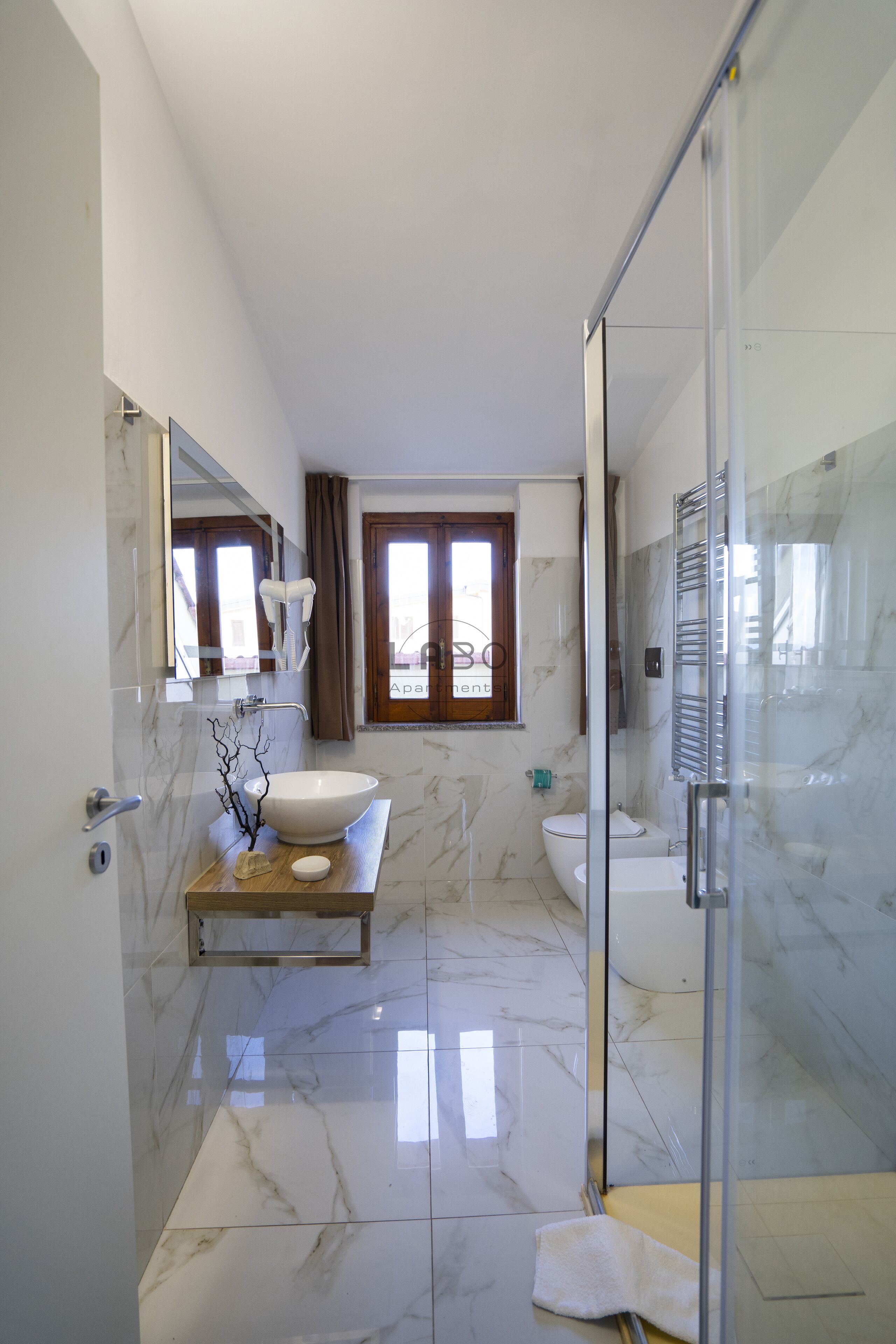 Deluxe-Doppelzimmer | Badezimmer | Dusche, Haartrockner, Bidet, Handtücher