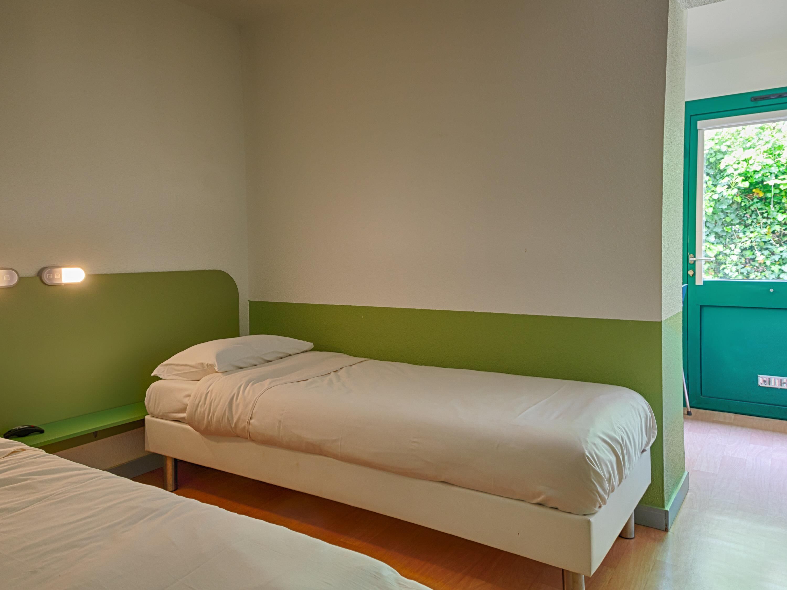 Kamar Twin, 2 Tempat Tidur Twin | Tirai kedap cahaya, Wi-Fi gratis, dan seprai linen