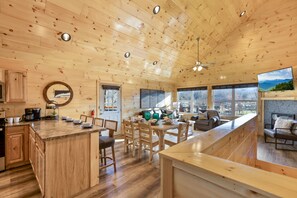 Cabane Signature, plusieurs chambres, bain à remous, vue fleuve | Restauration dans la chambre