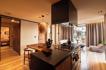 Apartment, 2 Bedrooms, Balcony, Garden View | Private kitchen | Full-size fridge, microwave, espresso maker, toaster at BESPOKE, member of Small Luxury Hotels