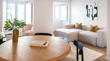 Premium bedding, memory foam beds, laptop workspace, blackout drapes