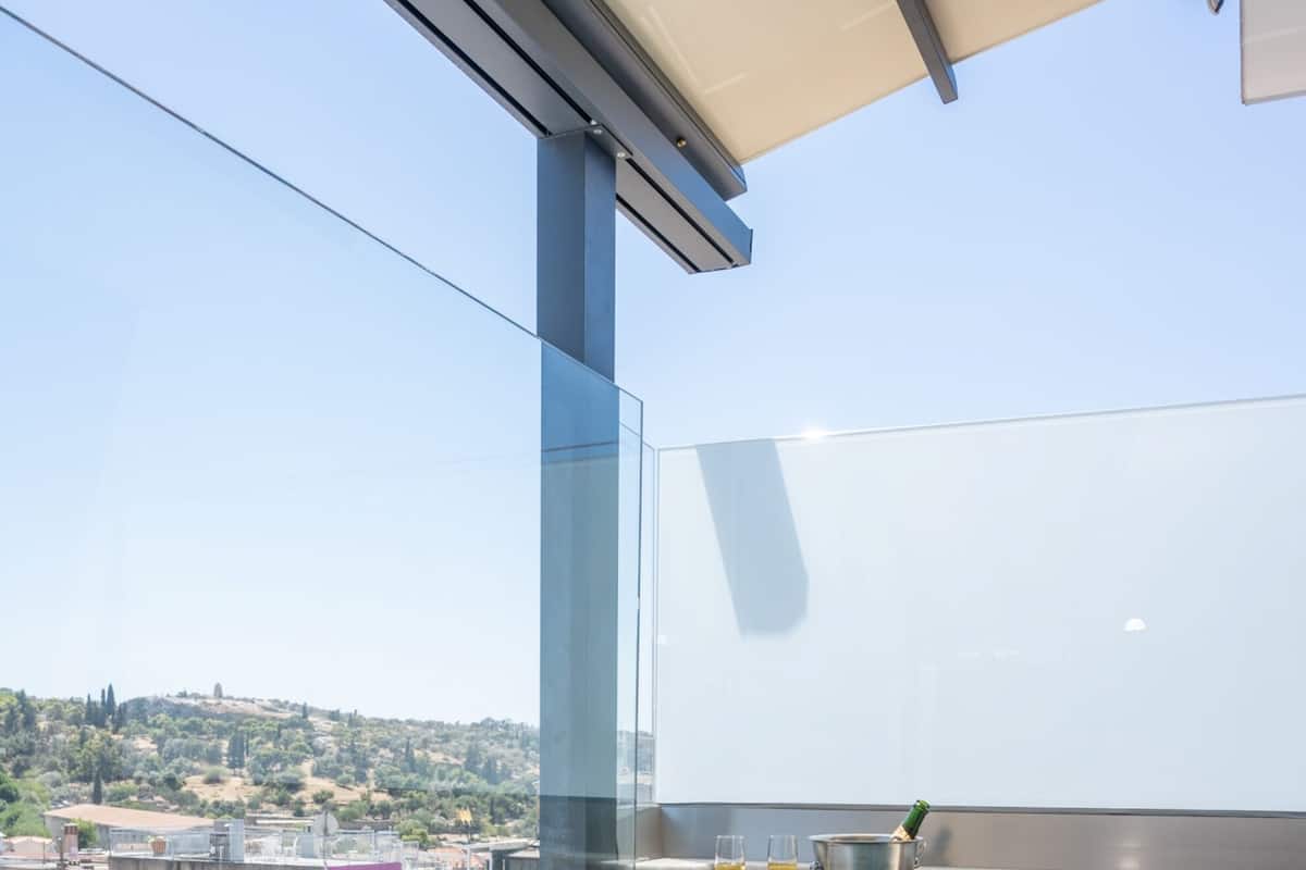 A rooftop hot tub with a clear view of the cityscape.