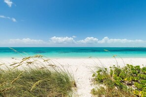 On the beach, sun-loungers, beach towels