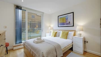 Deluxe Apartment, Balcony, City View | In-room safe, blackout curtains, iron/ironing board, free WiFi