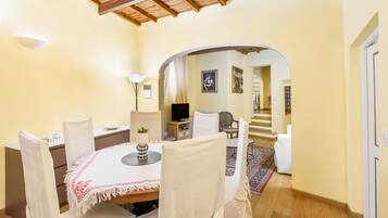Comfort Apartment | Living area | 40-inch flat-screen TV with digital channels