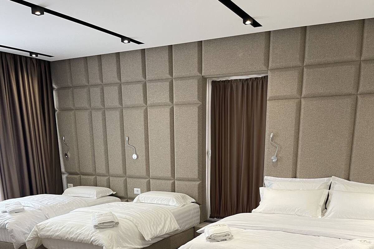 Deluxe vierpersoonskamer | 1 slaapkamer, een bureau, gratis wifi