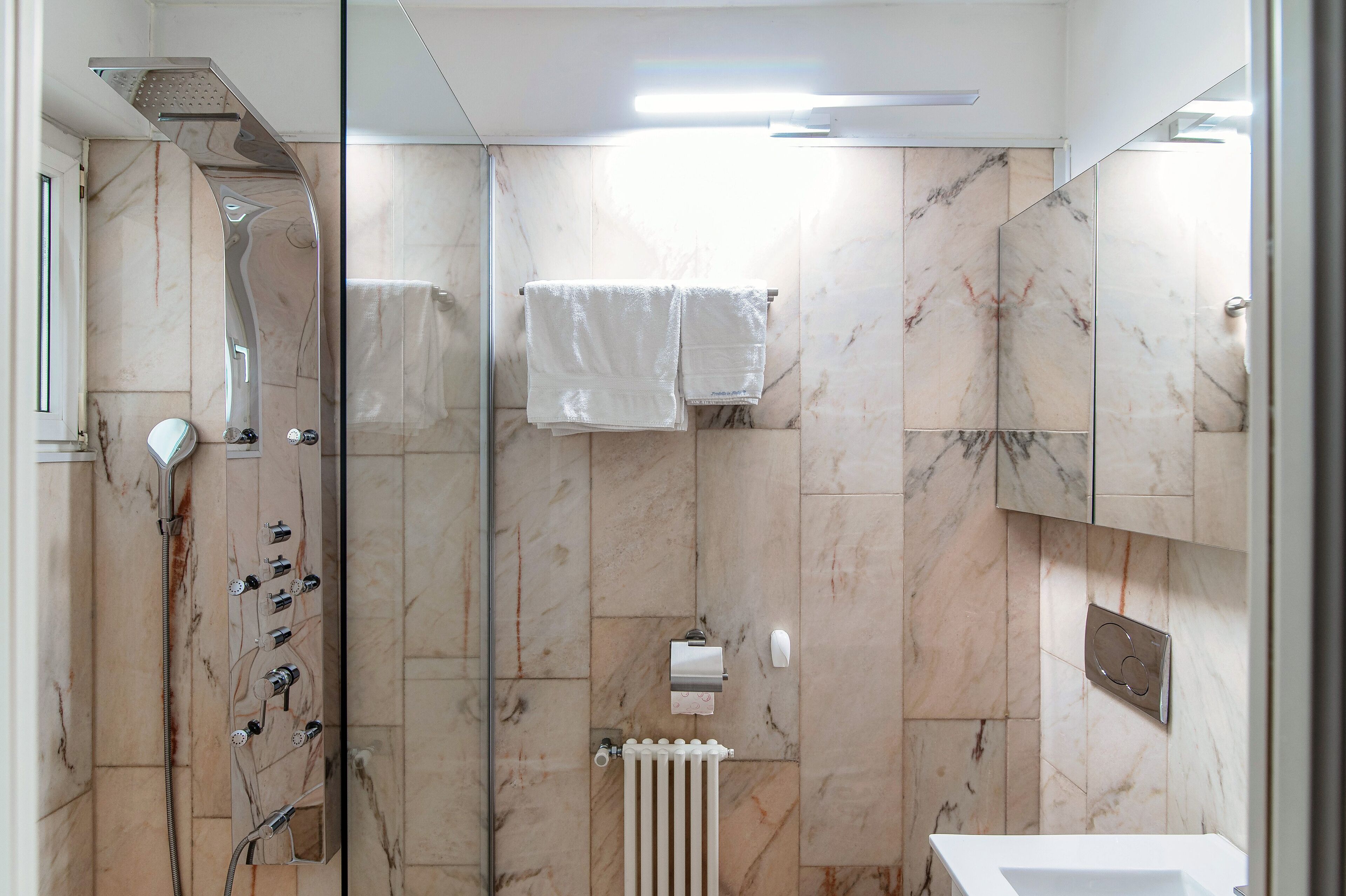 Classic Apartment | Bathroom | Shower, hair dryer, towels, soap