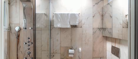Classic Apartment | Bathroom | Shower, hair dryer, towels, soap
