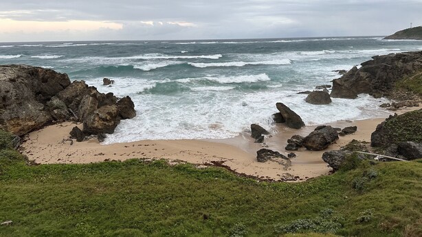 A coastal landscape with rocky outcrops, a sandy beach, and the ocean. - Spacious Lailamar Villa with Pool & Bar, Ocean View - Ground Floor (St. Philip)