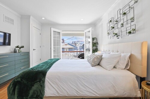 Escape to your luxury beach retreat, just a 3-minute walk to the ocean and minutes from the energy of Asbury Park.