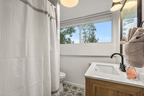 Hair dryer, towels, soap, shampoo